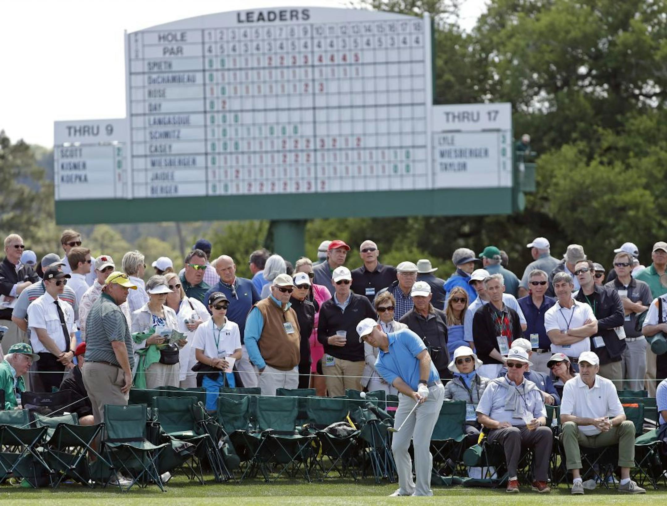 Amateur Sammy Schmitz hits to the ninth green during the first round of the Masters golf tournament Thursday, April 7, 2016, in Augusta, Ga.