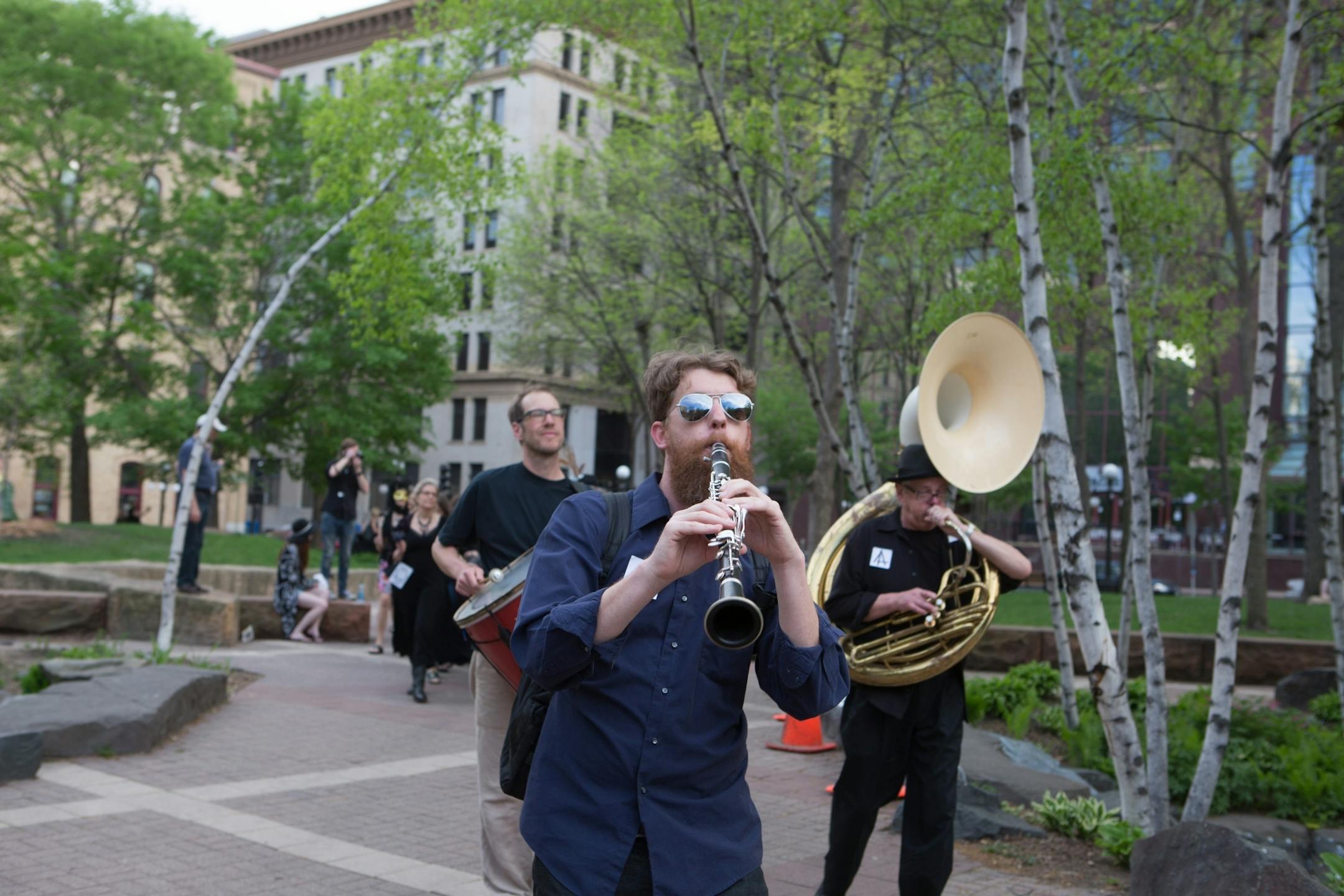 Former Jax building tenants and Lowertown arts supporters hold a wake to honor their longtime artistic quarters. Funeral began at Union Depot and then proceeded to the Jax building
