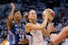 Phoenix Mercury's Penny Taylor, drives past Minnesota's Seimone Augustus during the second half in Game 1 of the WNBA basketball Western Conference fi