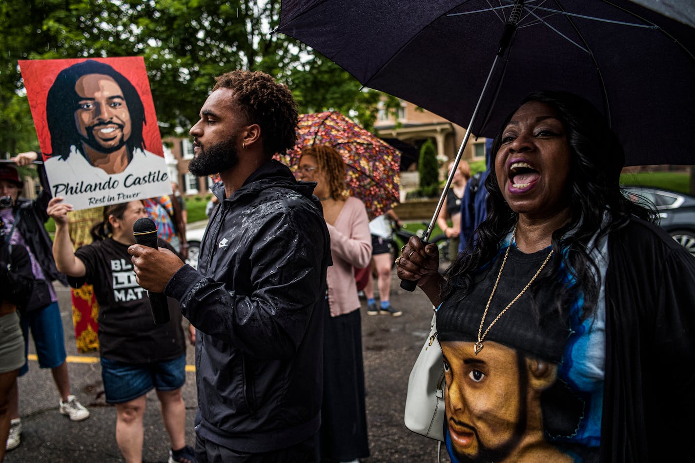 In St. Paul, Minnesota on July 6, 2021, near the Minnesota Governor's Mansion, Valerie Castile spoke about her son to protesters including activist Brandyn Tulloch(cq) on the left who gathered for the 5th anniversary of Philando Castile's death at the hands of police.] RICHARD TSONG-TAATARII ¥ Richard.Tsong-Taatarii@startribune.com