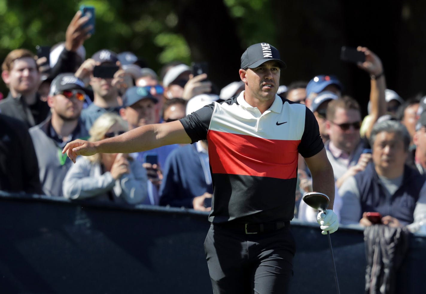 Brooks Koepka watches his tee shot off the 15th hole during the first round of the PGA Championship golf tournament, Thursday, May 16, 2019, at Bethpage Black in Farmingdale, N.Y. (AP Photo/Charles Krupa)