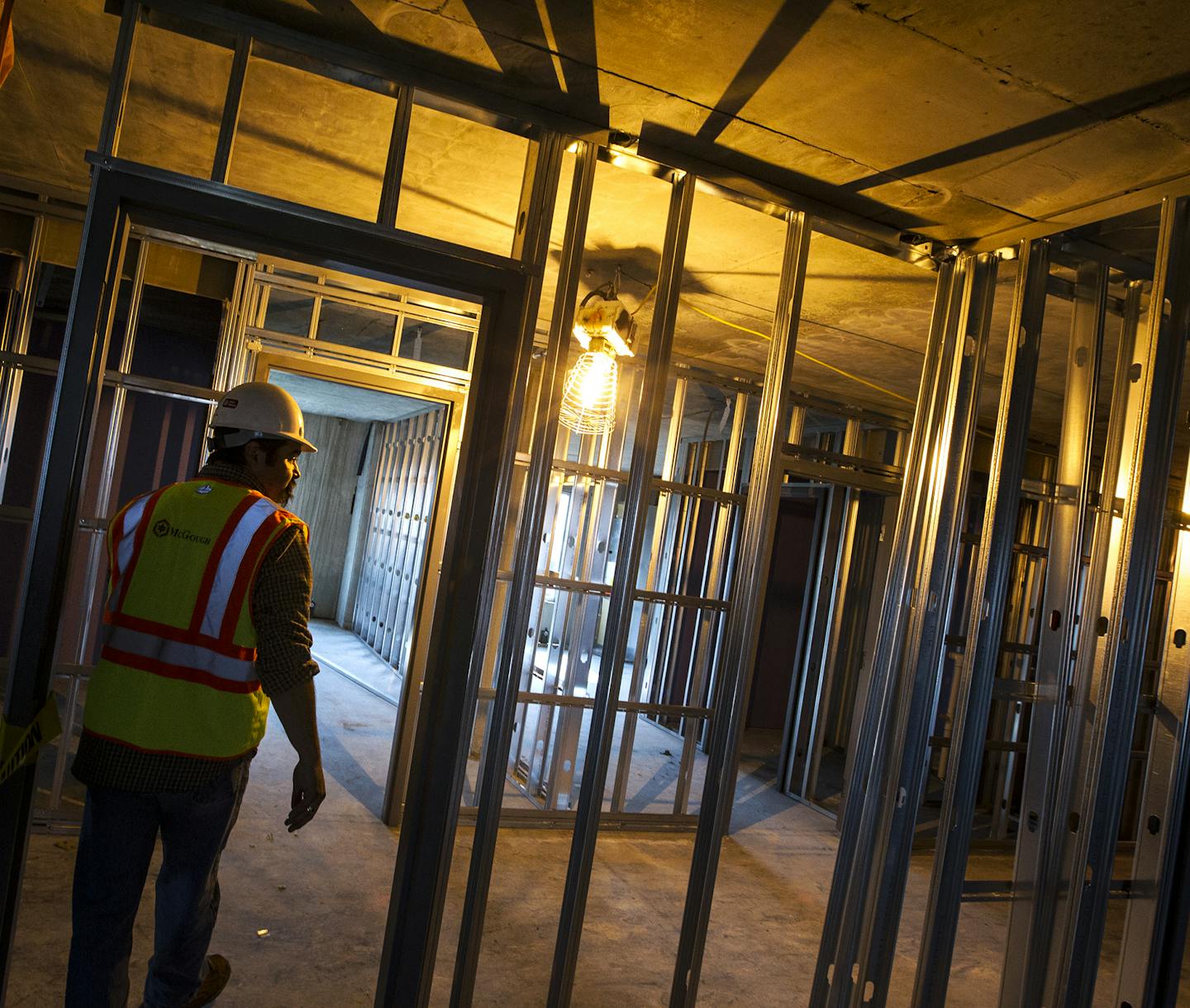 Patrick Steinberger, McGough construction superintendent, walks through a McGough Construction site in Bloomington May 27, 2015. (Courtney Perry)