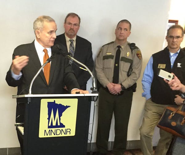 Minnesota Gov. Mark Dayton discusses his proposal for tougher penalties against poachers on Friday in Brooklyn Center.