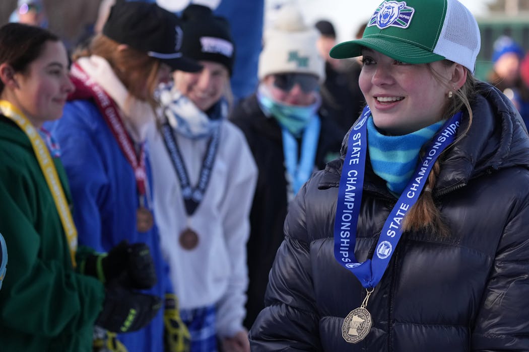 Vivien Pihlstrom of Blake wore her medal after winning the girls individual Alpine skiing state title.