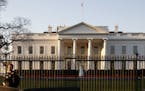 The White House is seen in the early morning light in Washington, Saturday, April 14, 2018, the morning after the U.S. military response, along with F