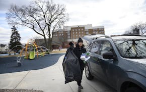 Krystle D'Alencar, a recently laid-off worker from Tattersall Distilling, brought supplies to donate to vulnerable communities at Peavey Park Saturday