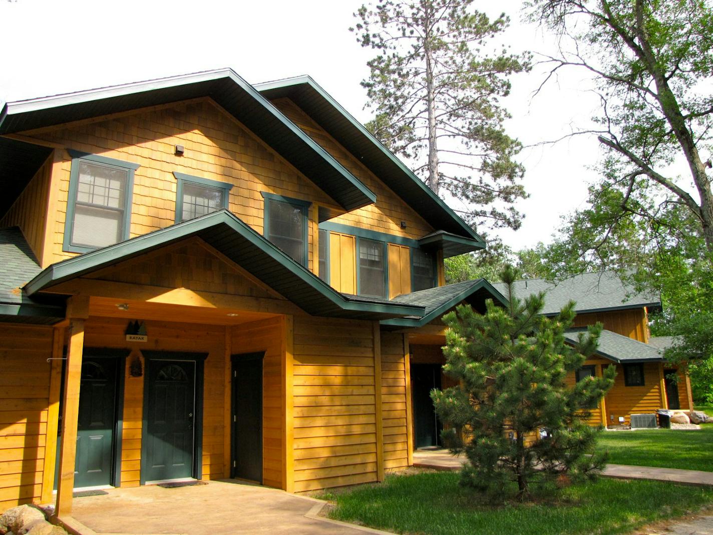 Well-appointed two-story cottages are gradually replacing traditional 1930s cottages at Clamshell Beach.