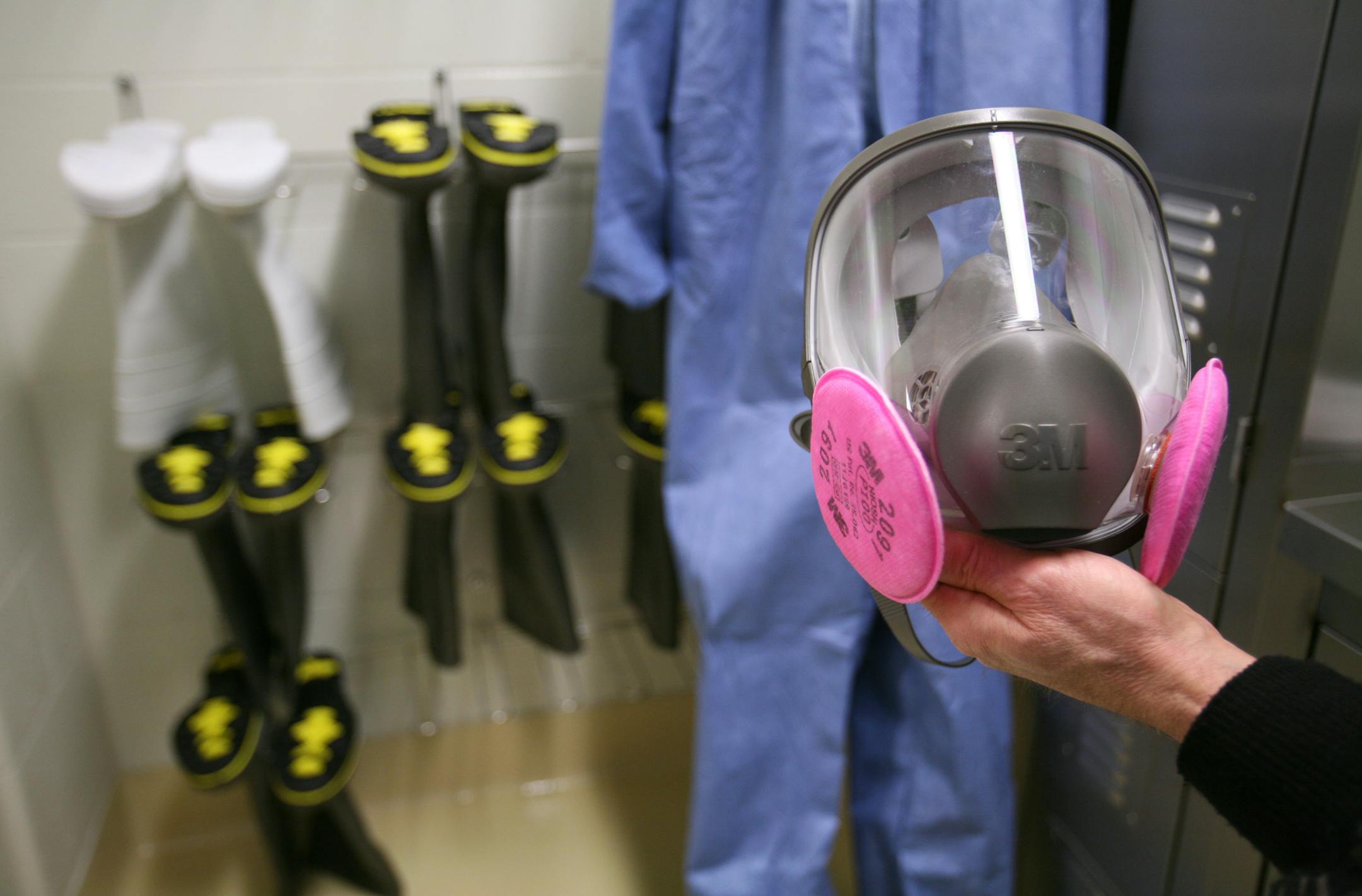 Custom-fitted face masks will be stored with other protective equipment for workers at the Veterinary Diagnostic Laboratory on the University of Minnesota's St. Paul campus. Workers will change into protective gear before encountering infected specimens if there is a disease outbreak.