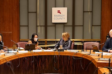 Longtime Ramsey County Commissioners Jim McDonough, second from right, and Toni Carter, second from left, are not seeking reelection and will be retir