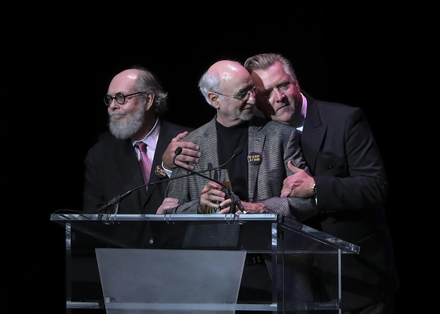 Jeffrey Hatcher, director Ron Peluso, and Chan Poling, from left, together at the podium as Peluso accepted the award for Overall Excellence for their work on Glensheen.