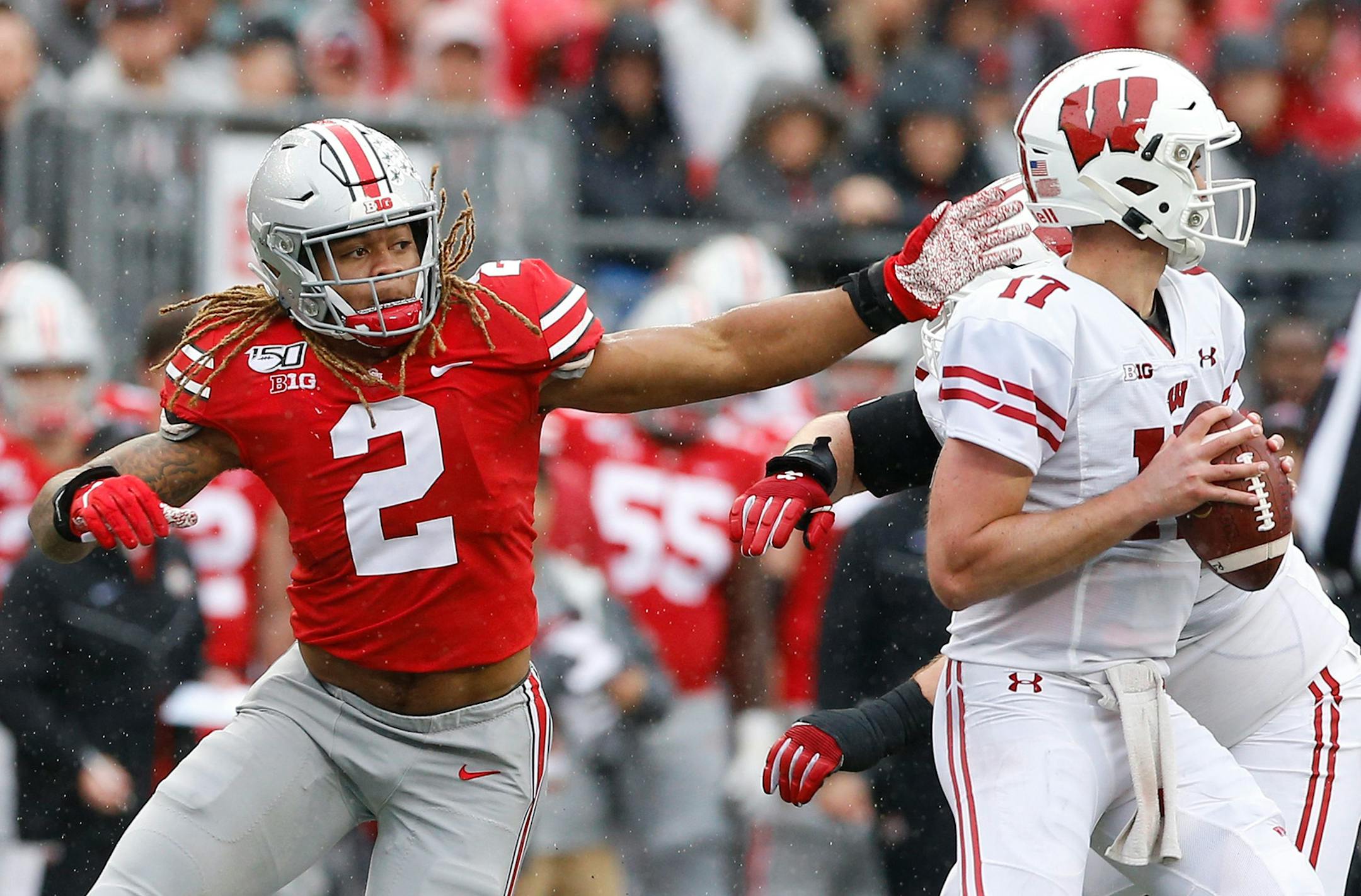 Ohio State defensive end Chase Young pressures Wisconsin quarterback Jack Coan last season.