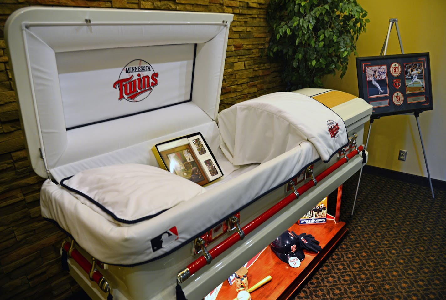 Elaine Arnold, 84, was a lifelong Twins fan, spending decades yelling at Killebrew, Carew, Puckett and Mauer in person and at the TV. When she died, her family was delighted to find a baseball-shaped urn with a Twins logo resting on a home plate-shaped pedestal to store her remains. She could have opted for a logo-emblazoned casket, thanks to new offerings by a White Bear Lake funeral home.] Richard.Sennott@startribune.com Richard Sennott/Star Tribune St Paul Minn. Tuesday 4/15/2014) ** (cq)