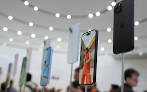 FILE - iPhone 15 phones are shown during an announcement of new products on the Apple campus in Cupertino, Calif., Sept. 12, 2023.