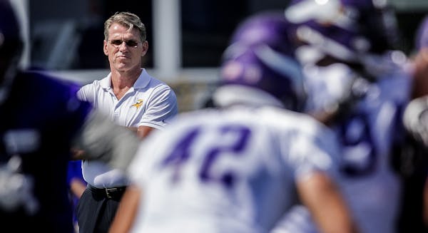 Minnesota Vikings general manager Rick Spielman. watches the results of his draft-dealing at training camp in July 2017.