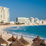 Resort hotels line the beach in Cancun, Mexico.