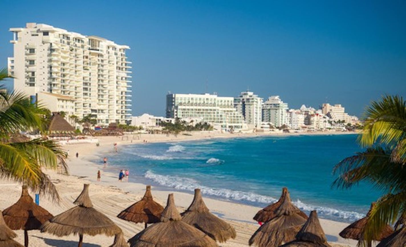 Resort hotels line the beach in Cancun, Mexico.