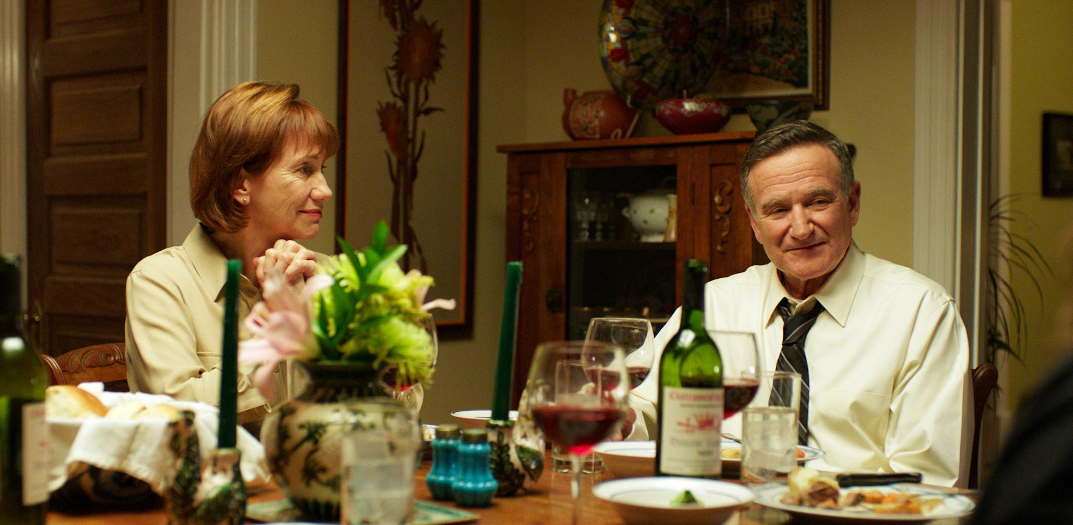 In this image released by Starz Digital, Kathy Baker, left, and Robin Williams appear in a scene from the film, "Boulevard." In the film, Williams plays a closeted gay man who comes out in his 60&#xed;s and then leaves his lifelong love, his wife of 40 years, played by Baker. (Starz Digital via AP)