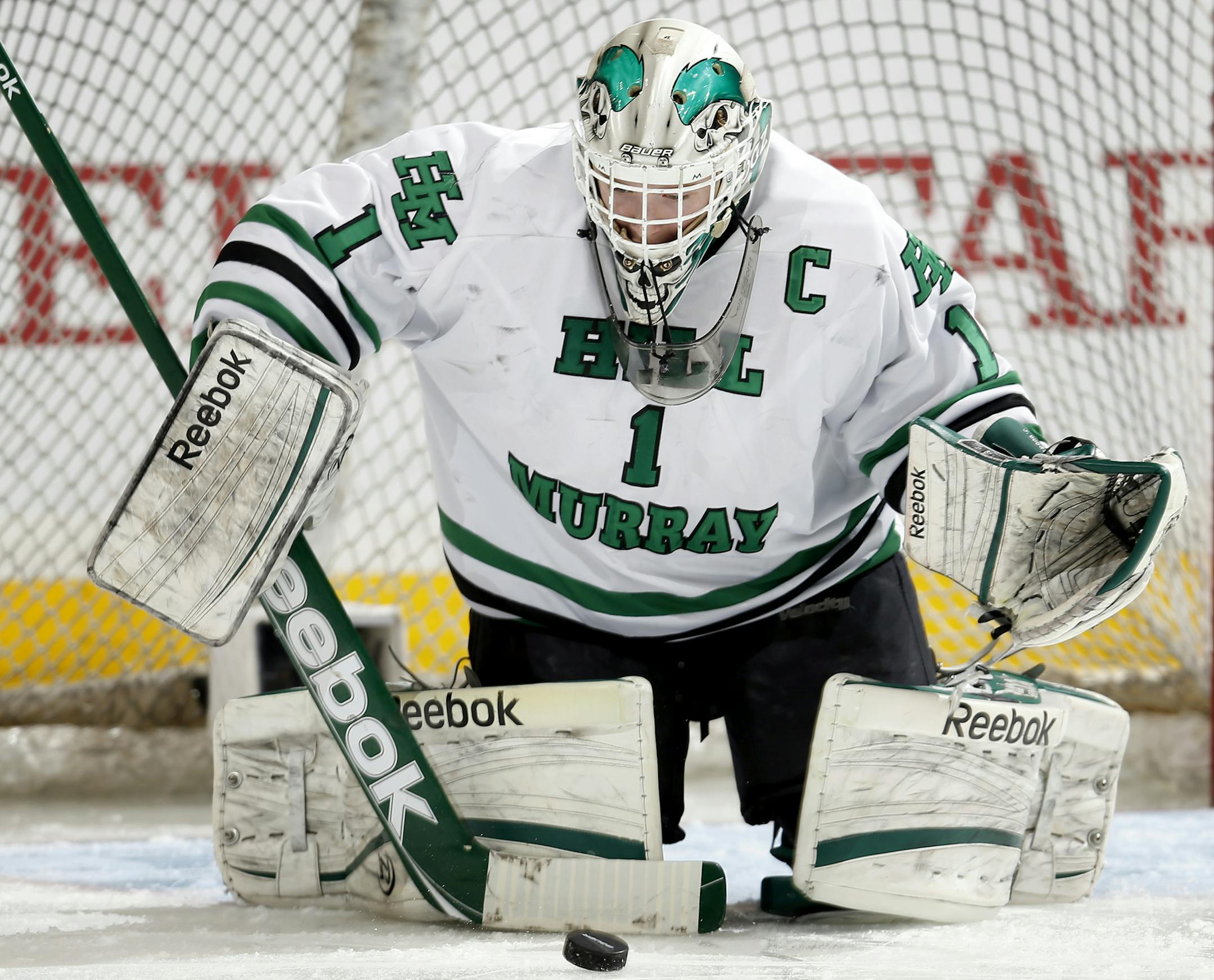 Hill Murray goalie John Dugas (1) made a save in the first period. ] CARLOS GONZALEZ cgonzalez@startribune.com - March 7, 2013, St. Paul, Minn., Xcel Energy Center, Minnesota High School Boys State Hockey, Class 2A quarterfinals, Hill Murray vs. Eastview
