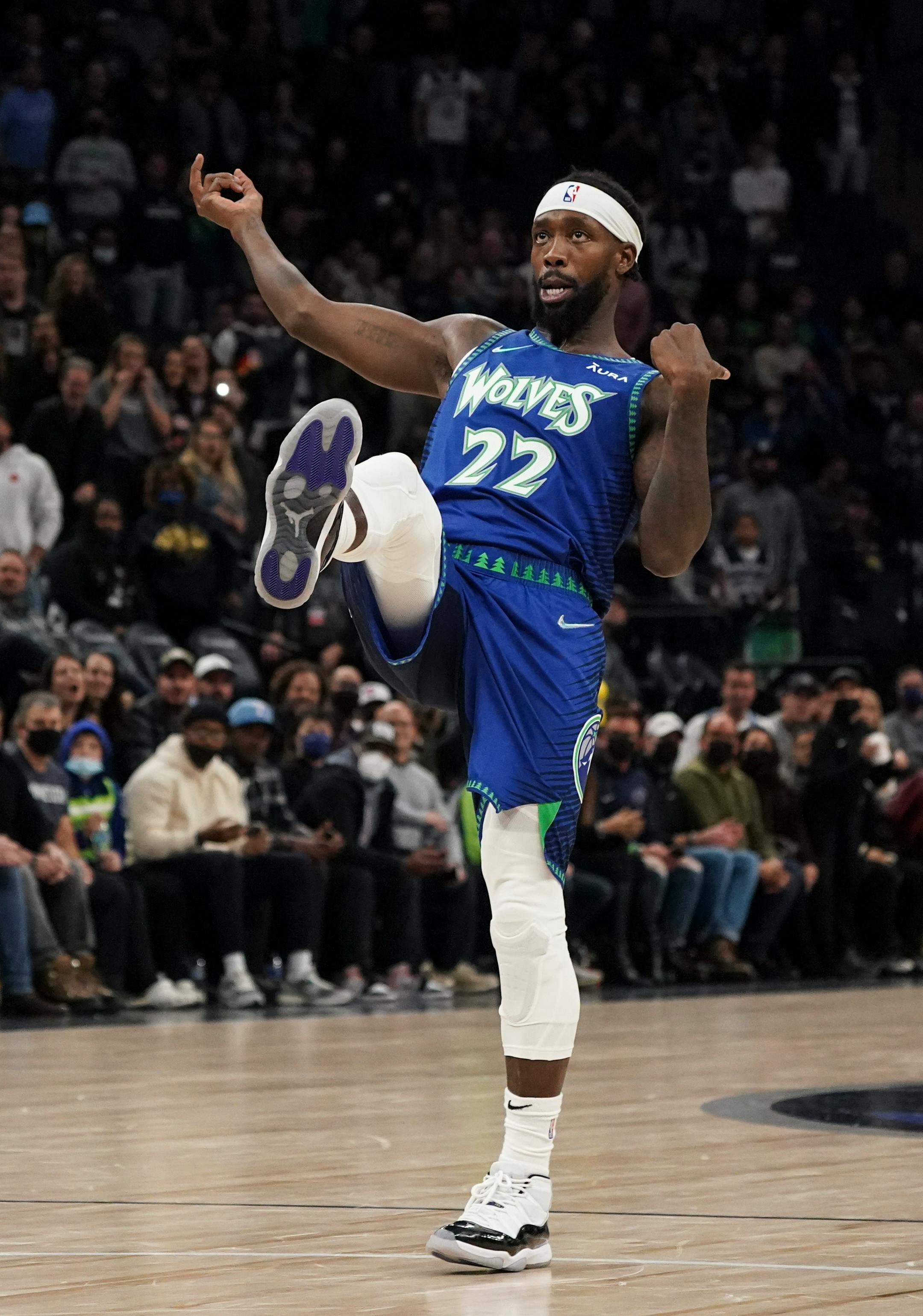 Minnesota Timberwolves guard Patrick Beverley (22) leans back after shooting and missing crucial free throw in the final moments of the game.