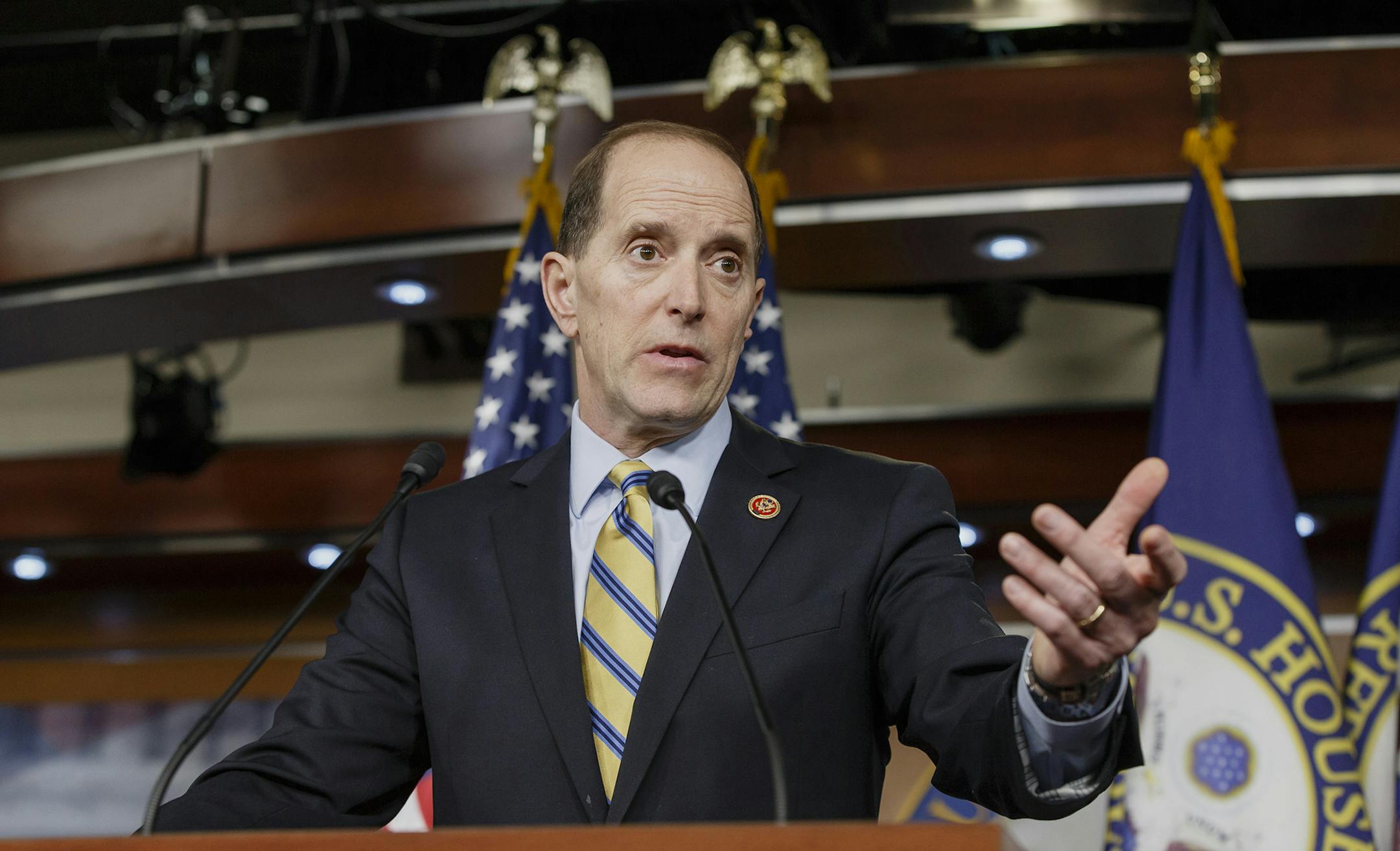 House Ways and Means Committee Chairman Rep. Dave Camp, R-Mich., the House tax writer, speaks with reporters on Capitol Hill in Washington, Wednesday, Feb. 26, 2014, to outline a major plan to rewrite the nation‚Äôs tax code. The plan has almost no chance of becoming law this year says Senate Republican leader Mitch McConnell, and even House Speaker John Boehner, R-Ohio, distanced himself from the details earlier in the day. (AP Photo/J. Scott Applewhite) ORG XMIT: MIN2014040412
