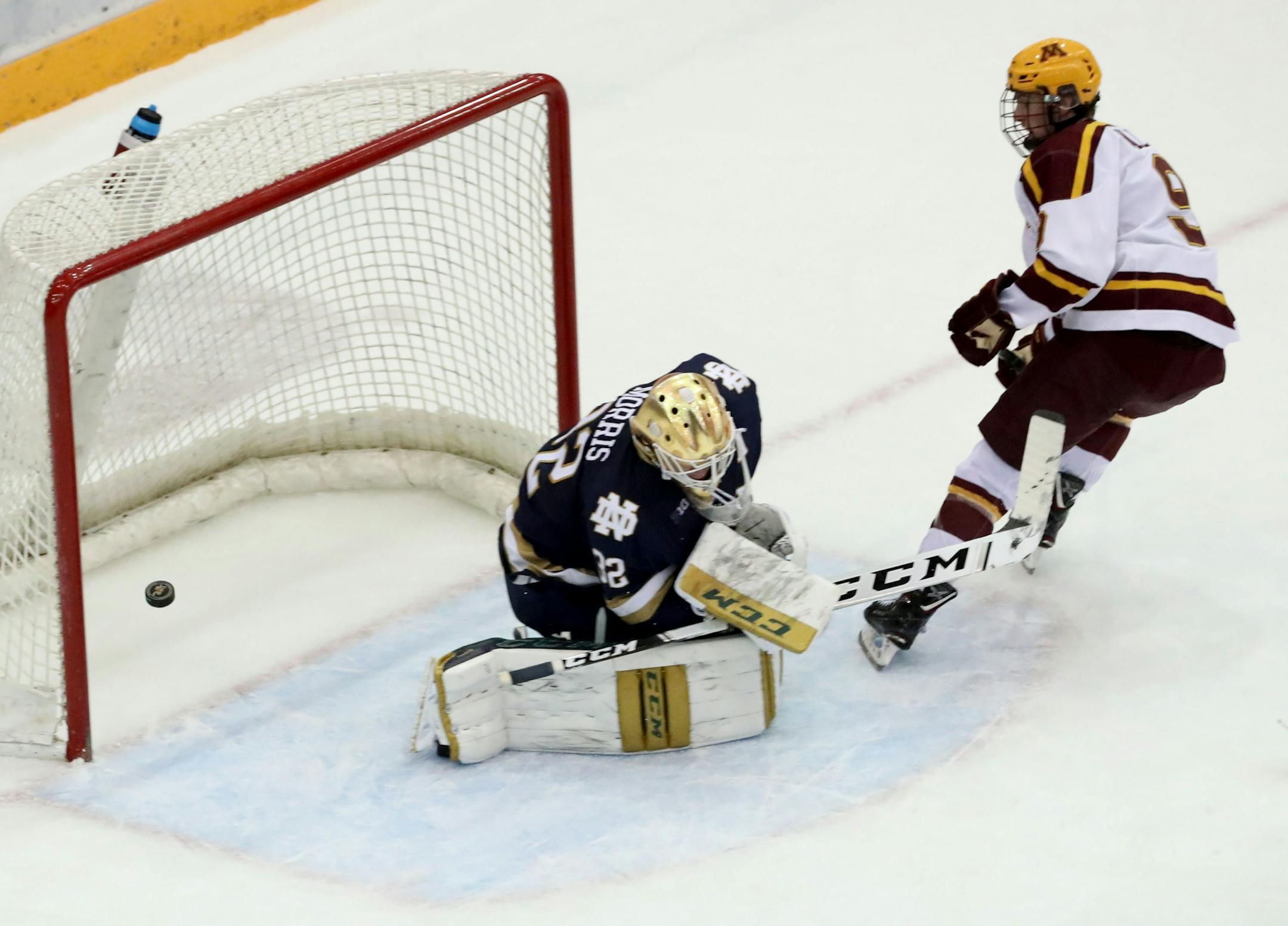 Sammy Walker got a shot past Notre Dame goalie Cale Morris for the game-winner in the second overtime.