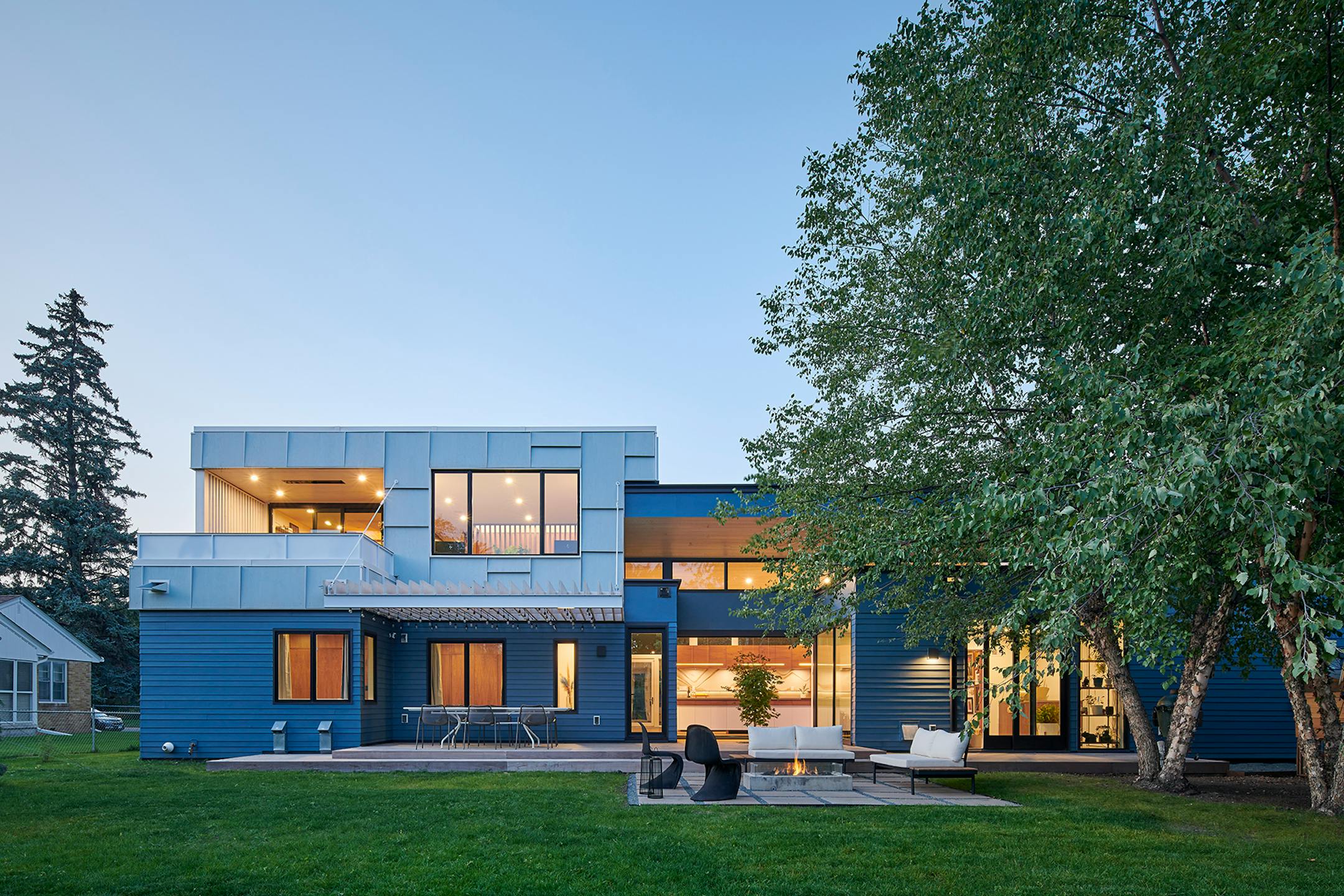 After a fire forced a remodel of a St. Louis Park home, a family hoped for a footprint similar to their original single-story ranch-style house. At the same time, they were game for introducing new, bold and unique materials and design features such as soaring rooflines and transom windows that allow light to come in and display the family's vast plant collection like never before.