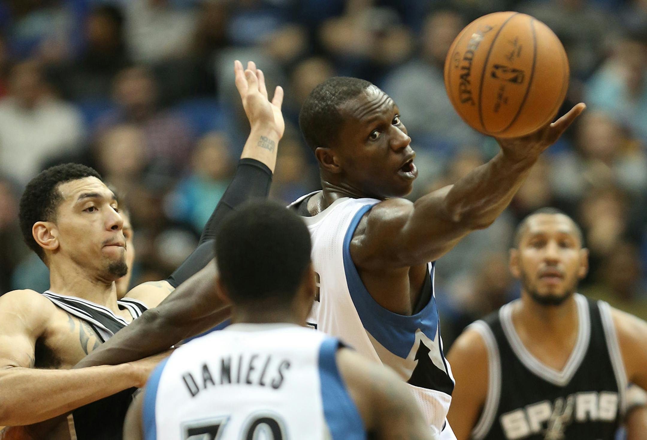 Wolves Gorgui Dieng tried to get control of the ball during the first half. ] (KYNDELL HARKNESS/STAR TRIBUNE) kyndell.harkness@startribune.com Timberwolves vs San Antonio at the Target Center in Minneapolis Min., Saturday, January 10, 2014.
