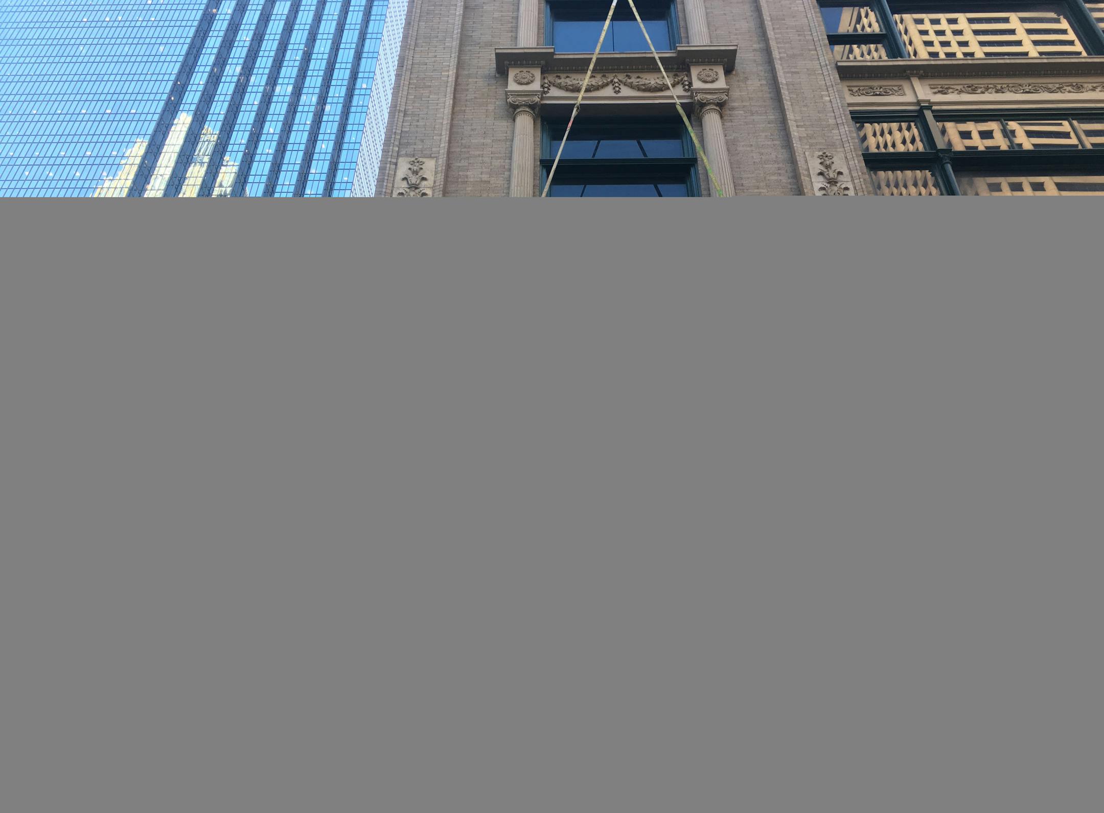 ] MARK VANCLEAVE ¥ Workers hung new signage on the "The Dayton's Project" on Thursday, Aug. 29, 2019 in Minneapolis.