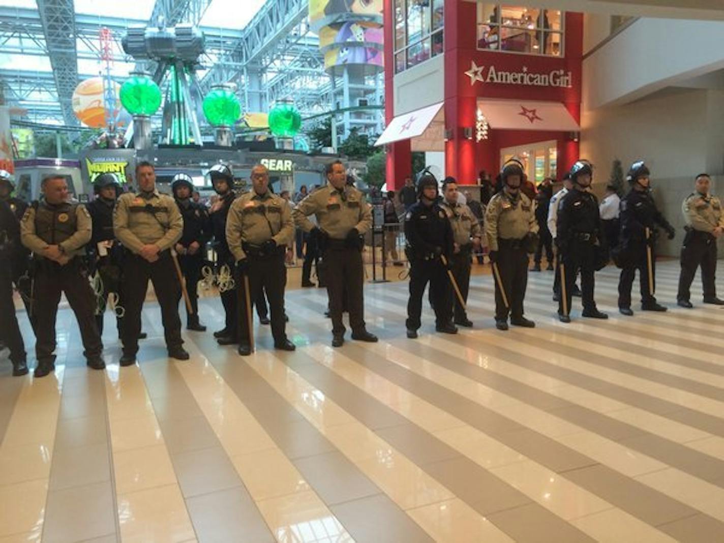 Police were out in full force Wednesday at the Mall of America as the public-address system urged shoppers to "seek shelter" as the mall went into lockdown.