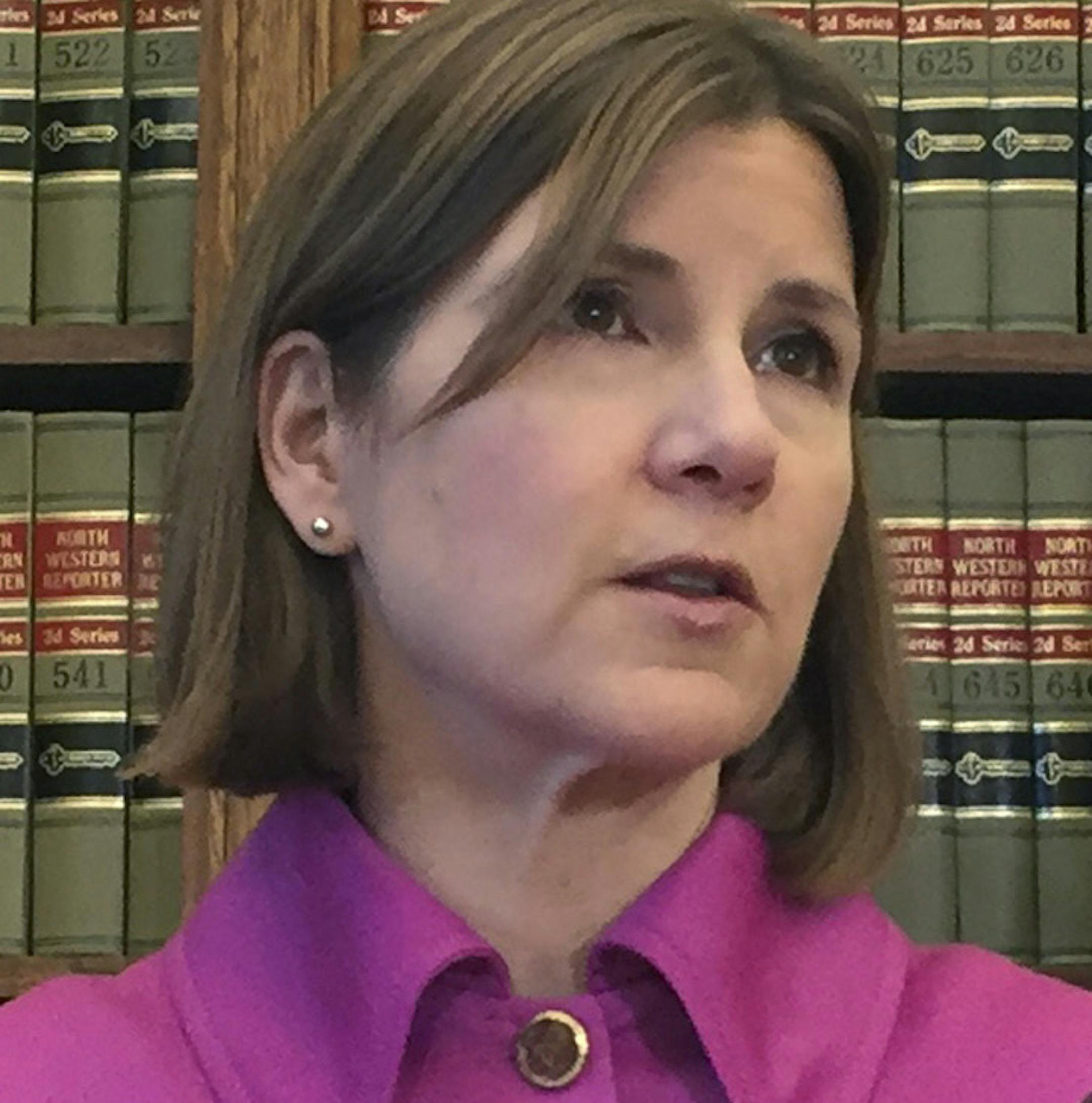 Minnesota Attorney General Lori Swanson announces she'll join a lawsuit with California and other states challenging President Donald Trump's decision to halt payments to insurers that had helped hold premiums down for people buying insurance under the Obama-era health care law on Friday Oct. 13, 2017, in St. Cloud, Minn. (AP Photo/Kyle Potter)