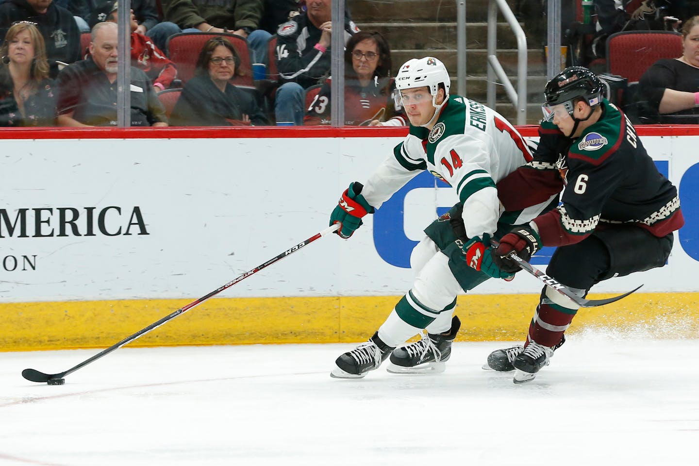 Wild center Joel Eriksson Ek shields Arizona defenseman Jakob Chychrun from the puck during a game Nov. 9.