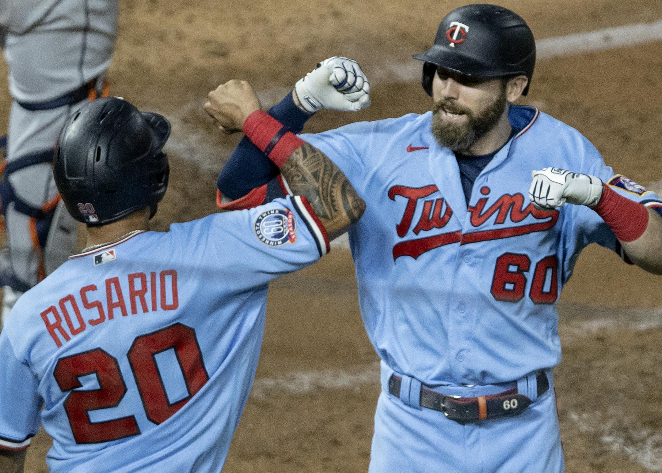 Minnesota Twins Jake Cave (60) celebrated with Eddie Rosario (20) after hitting a home run in the fourth inning. ] CARLOS GONZALEZ • cgonzalez@startribune.com – Minneapolis, MN – September 23, 2020, Target Field, MLB, Minnesota Twins vs. Detroit Tigers