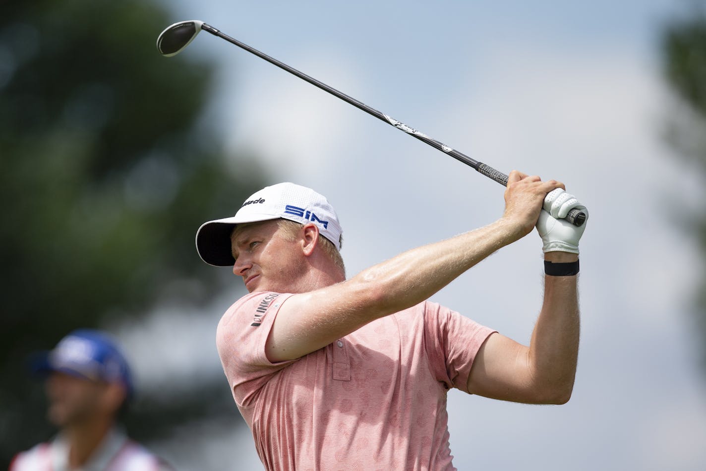 Adam Long tees on the 10th hole during the final round of the 3M Open golf tournament in Blaine, Minn., Sunday, July 26, 2020. (AP Photo/Andy Clayton- King)