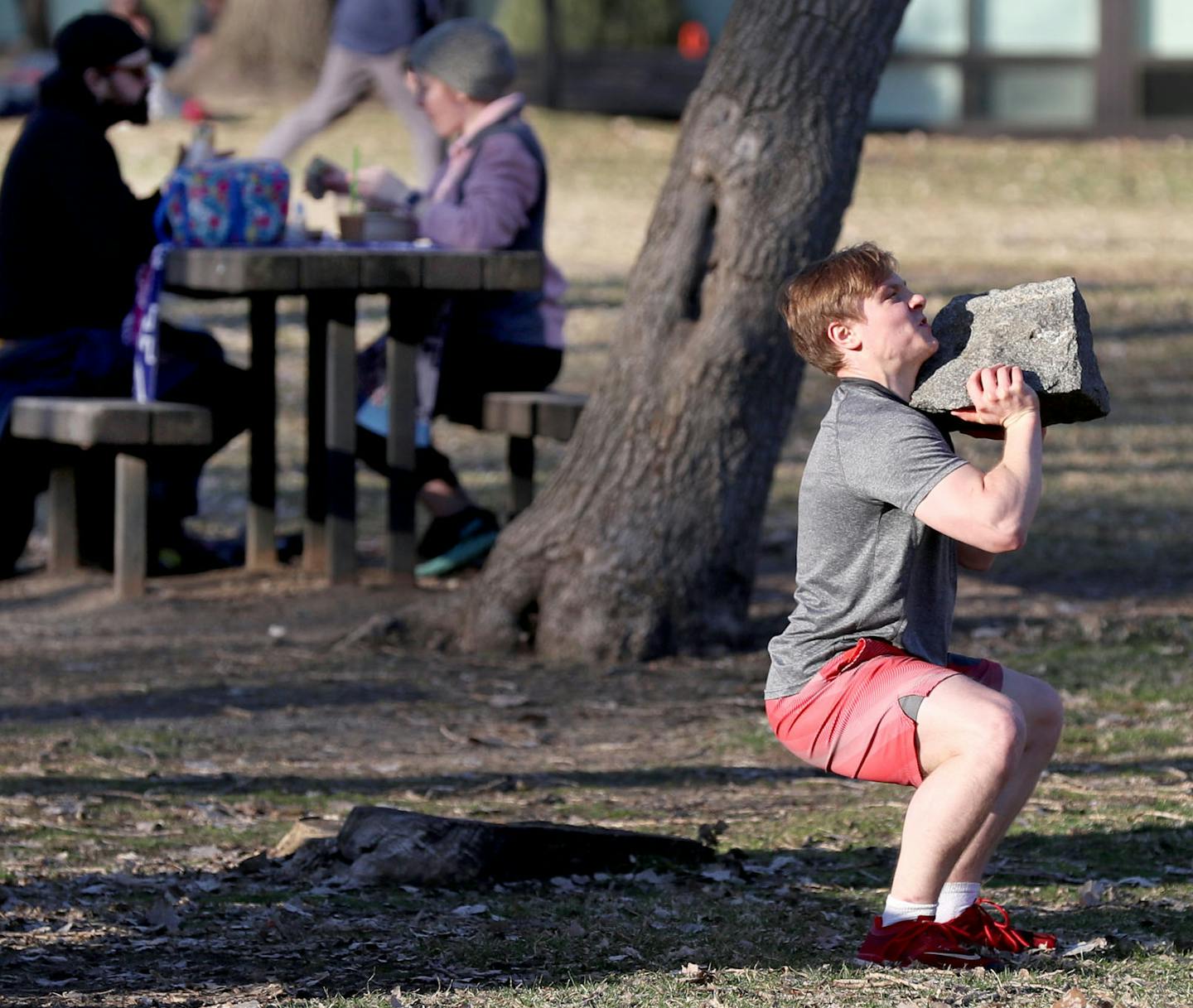 During sunny spring weather, people get out to exercise and take in the sun while practicing social distancing near the Stone Arch Bridge during the COVID-19 outbreak Tuesday, March 31, 2020, in Minneapolis, MN.] DAVID JOLES &#x2022; david.joles@startribune.com COVID photos of the day