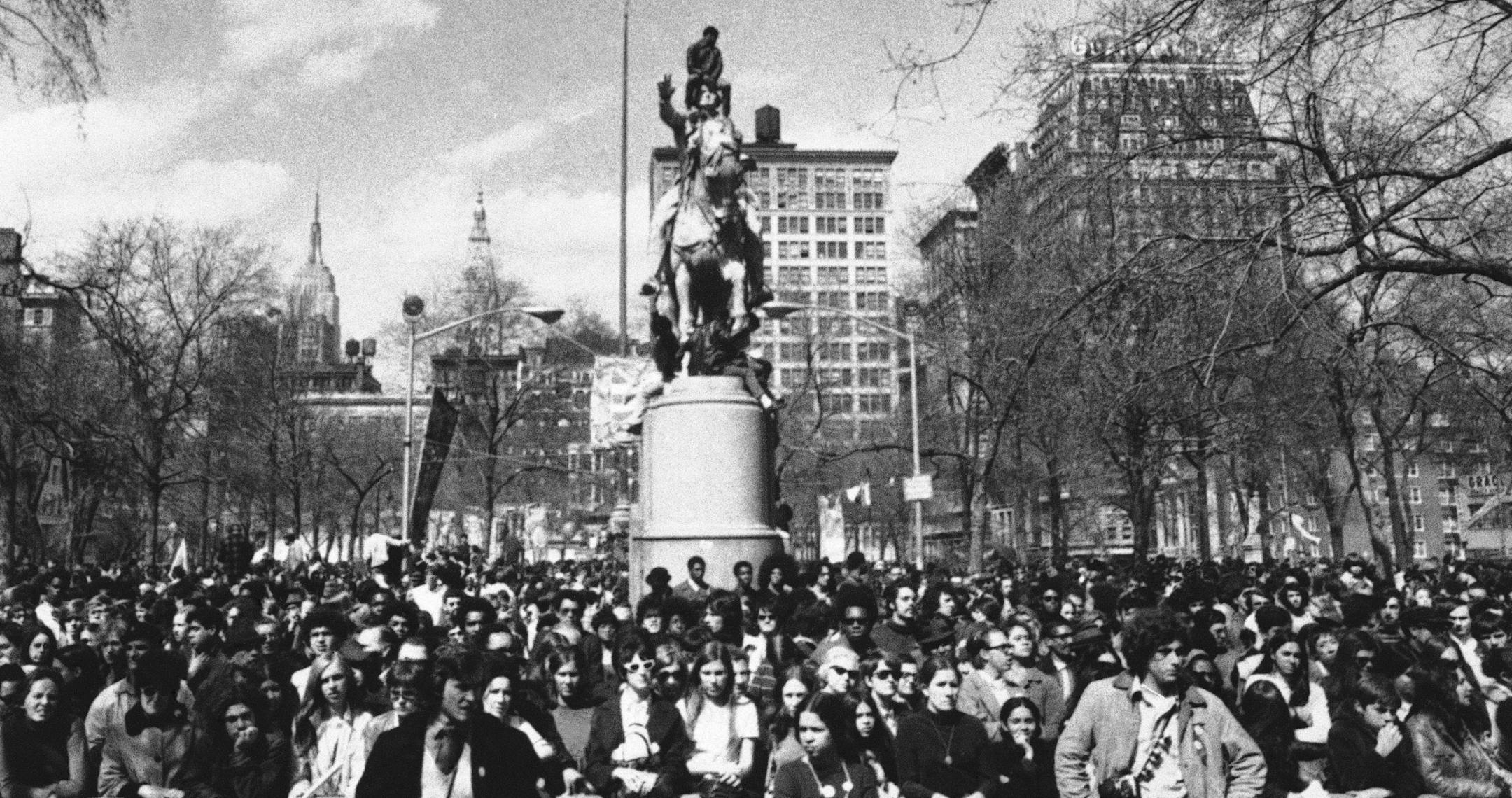 FILE - In this April 22, 1970 file photo, hundreds listen to Earth Day speakers after cleaning up New York's Union Square Park. (AP Photo)
