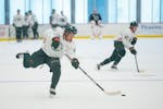 Forward Riley Heidt shoots the puck during Wild development camp Tuesday.