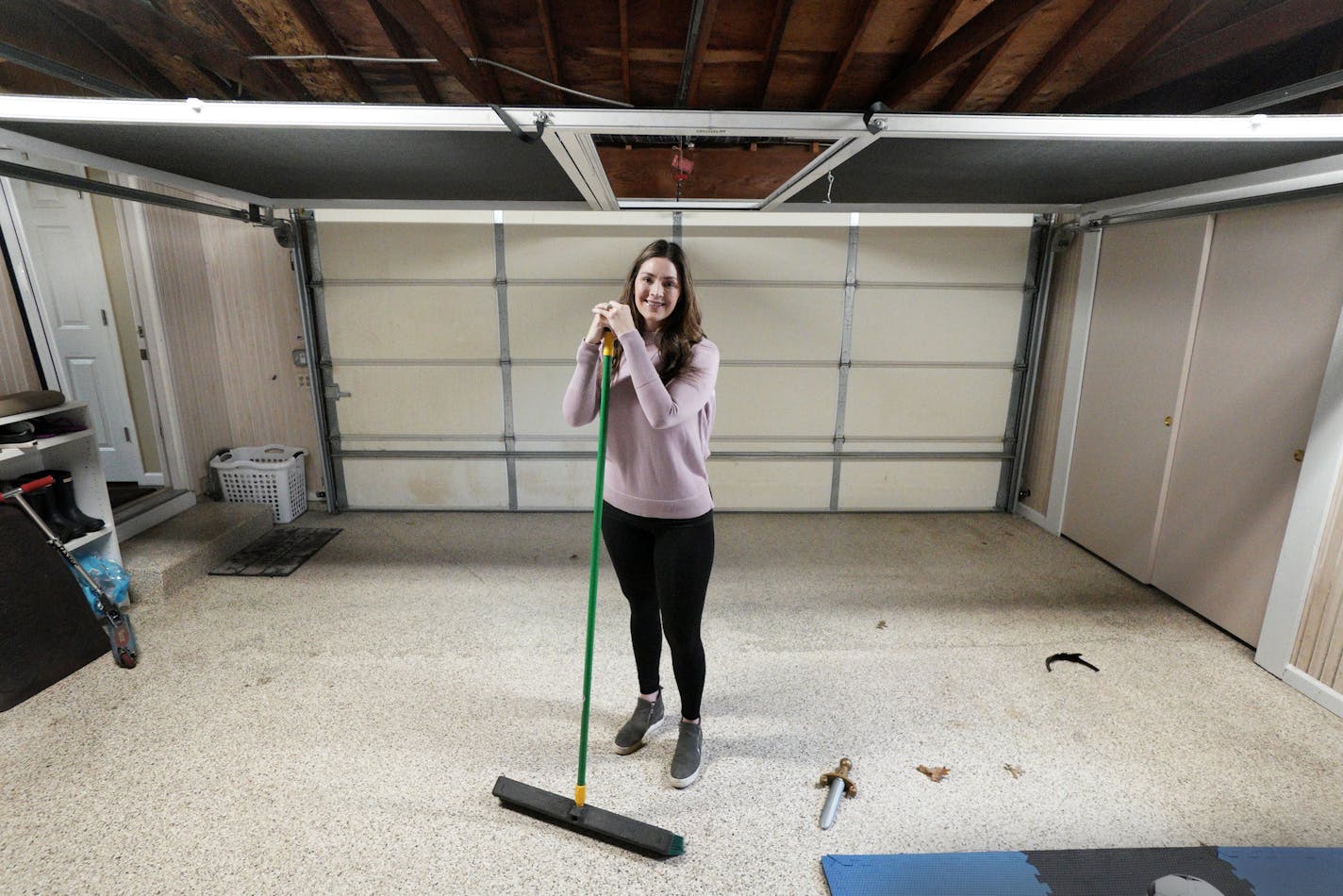 Molly Hakko inside the garage of her childhood home in the Johnsville neighborhood of Blaine where she was going to host the garage sale for the first time on her own since her mother passed away.) brian.peterson@startribune.com
Blaine, MN Thursday, April 30, 2020