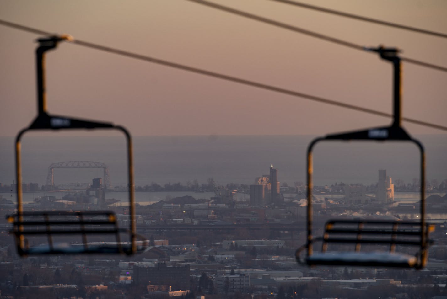 The sun rose over Lake Superior as seen from Spirit Mountain on Dec. 2. As the city proposes cutting tourism tax spending 25% for 2021, Spirit Mountain will see its subsidy increase.