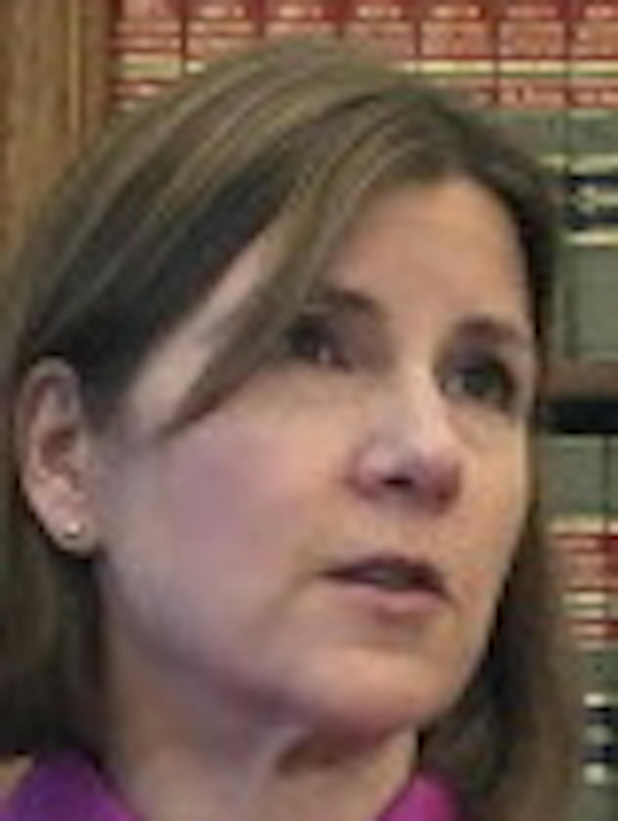 Minnesota Attorney General Lori Swanson announces she'll join a lawsuit with California and other states challenging President Donald Trump's decision to halt payments to insurers that had helped hold premiums down for people buying insurance under the Obama-era health care law on Friday Oct. 13, 2017, in St. Cloud, Minn. (AP Photo/Kyle Potter)