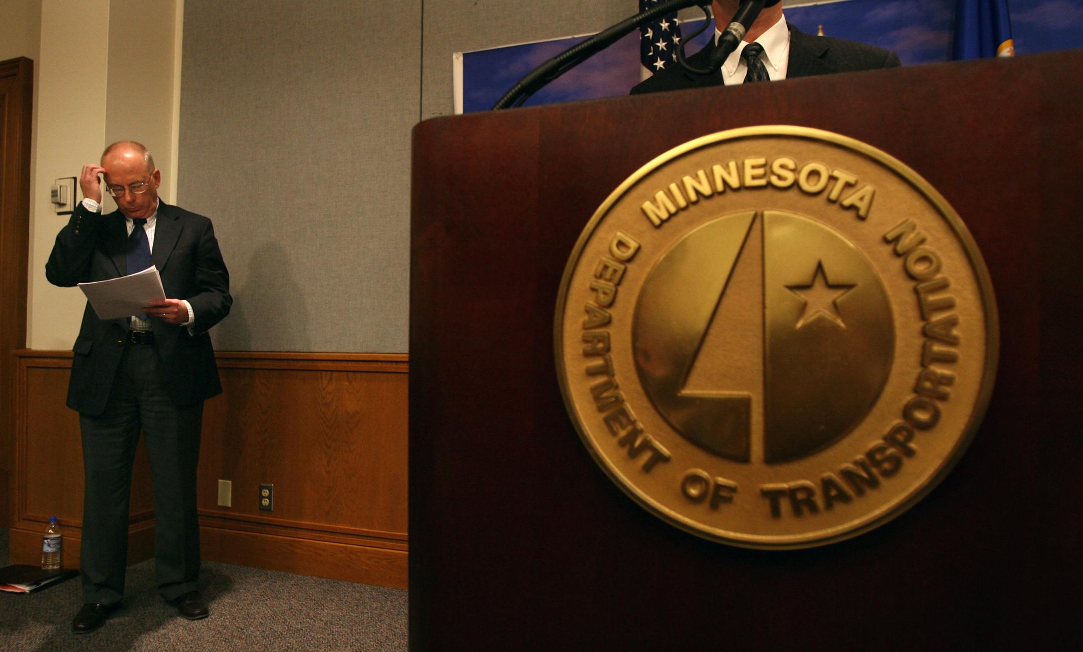 Dan Dorgan, a Minnesota Department of Transportation bridge engineer, looked over his notes before addressing the media on Tuesday.