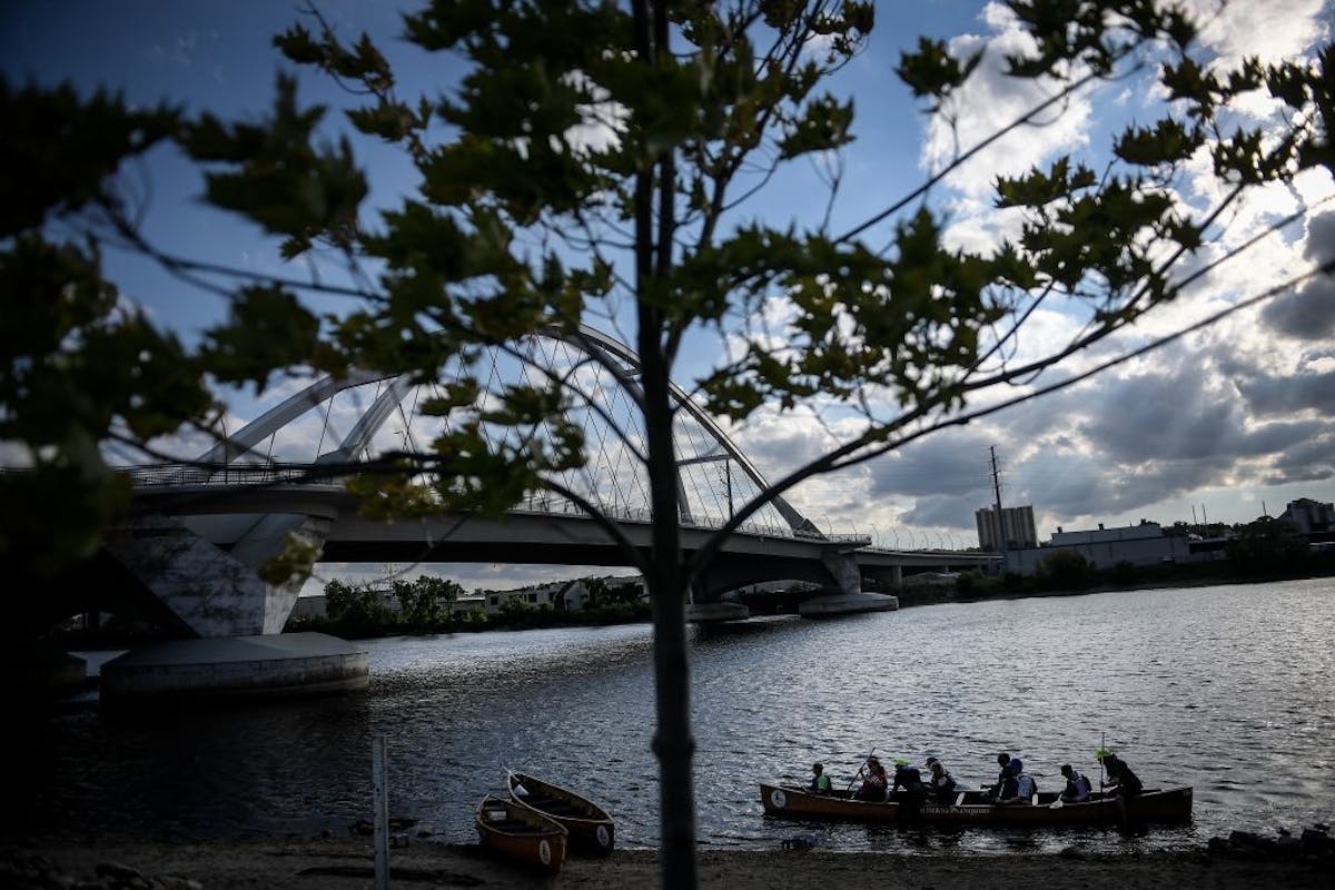 Paddlers returned from a free canoe ride on the Mississippi River Wednesday.
