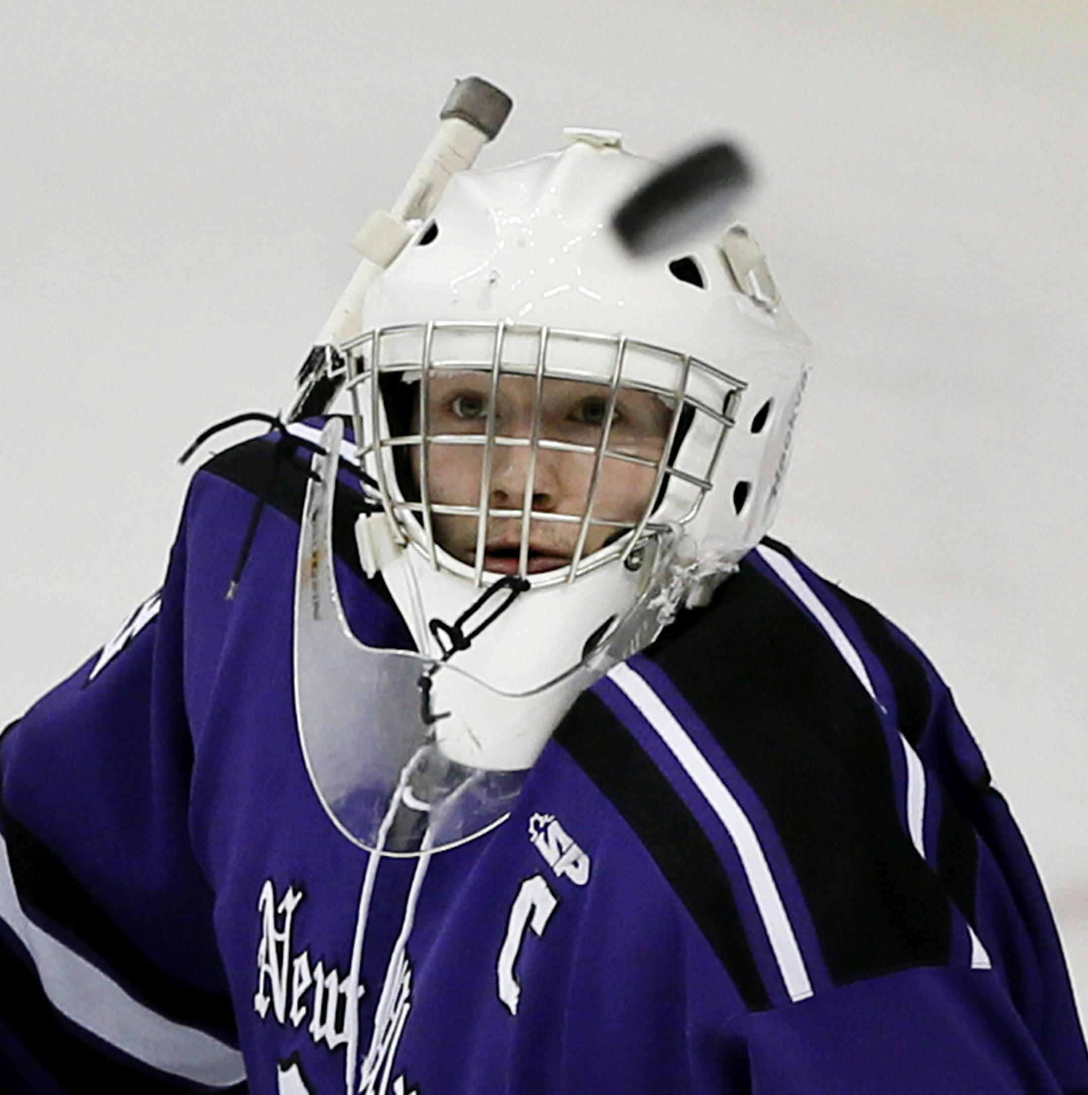 New Ulm goalkeeper Matt Berkner watched a shot pass by in the first period. Mahtomedi played New Ulm in the first game of the Class 1A quarterfinals boy's hockey state tournament at the Xcel Energy Center Wednesday March 4, 2015 in St. Paul, Minnesota. ] Jerry Holt/ Jerry.Holt@Startribune.com