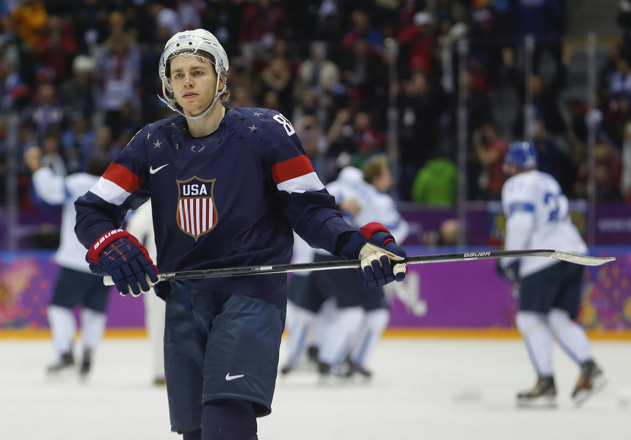 USA forward Patrick Kane skates off the ice after the USA lost 5-0 to Finland in the men's bronze medal ice hockey game at the 2014 Winter Olympics, Saturday, Feb. 22, 2014, in Sochi, Russia. (AP Photo/Petr David Josek)