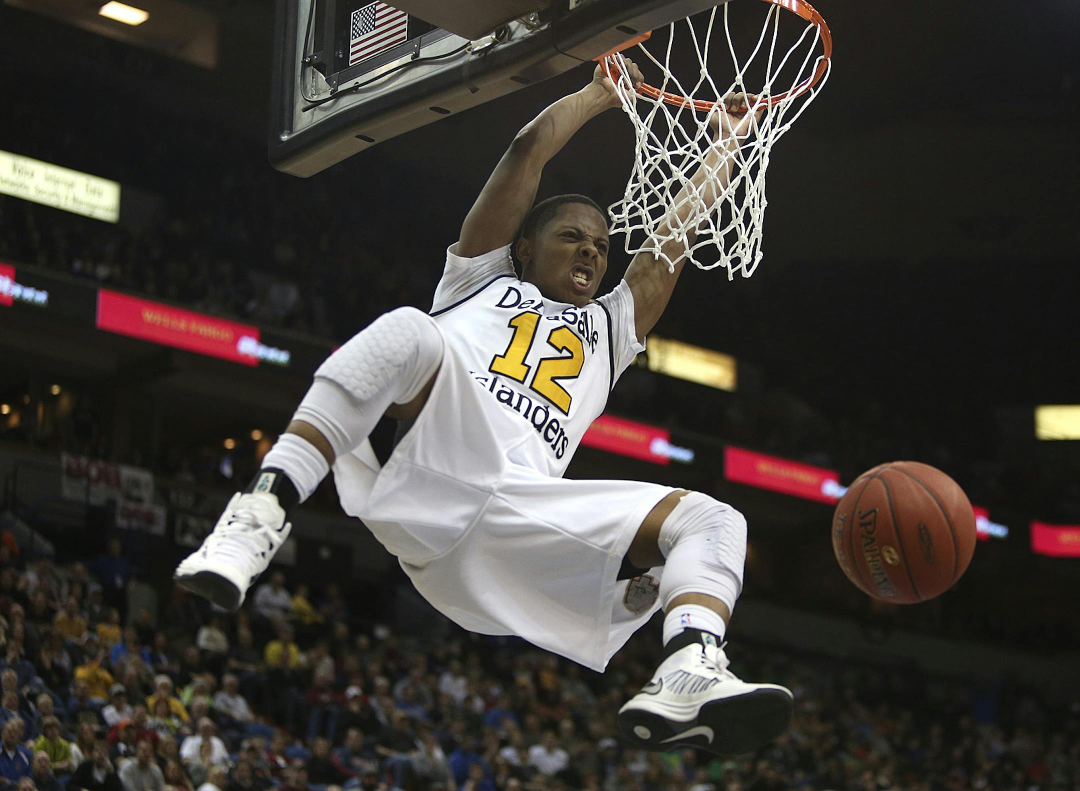 DeLaSalle's Jarvis Johnson dunked the ball during the second half of the class 3A championship at the Target Center in March.