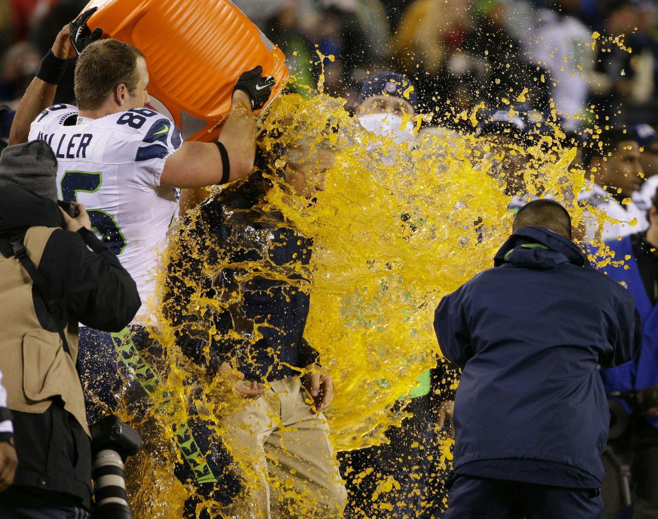 Seattle Seahawks players dump Gatorade on head coach Pete Carroll at the conclusion of a 43-8 win against the Denver Broncos in Super Bowl XLVIII at MetLife Stadium in East Rutherford, N.J., on Sunday, Feb. 2, 2014. (Mark Cornelison/Lexington Herald-Leader/MCT)