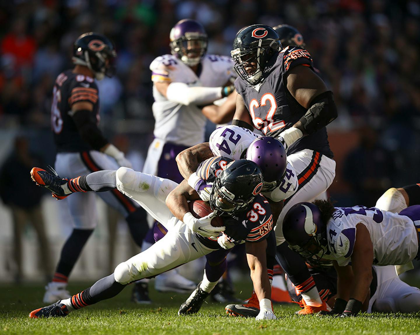 Vikings cornerback Captain Munnerlyn (24) stopped Bears running back Jeremy Langford (33) after he gained three yards in the fourth quarter Sunday afternoon.