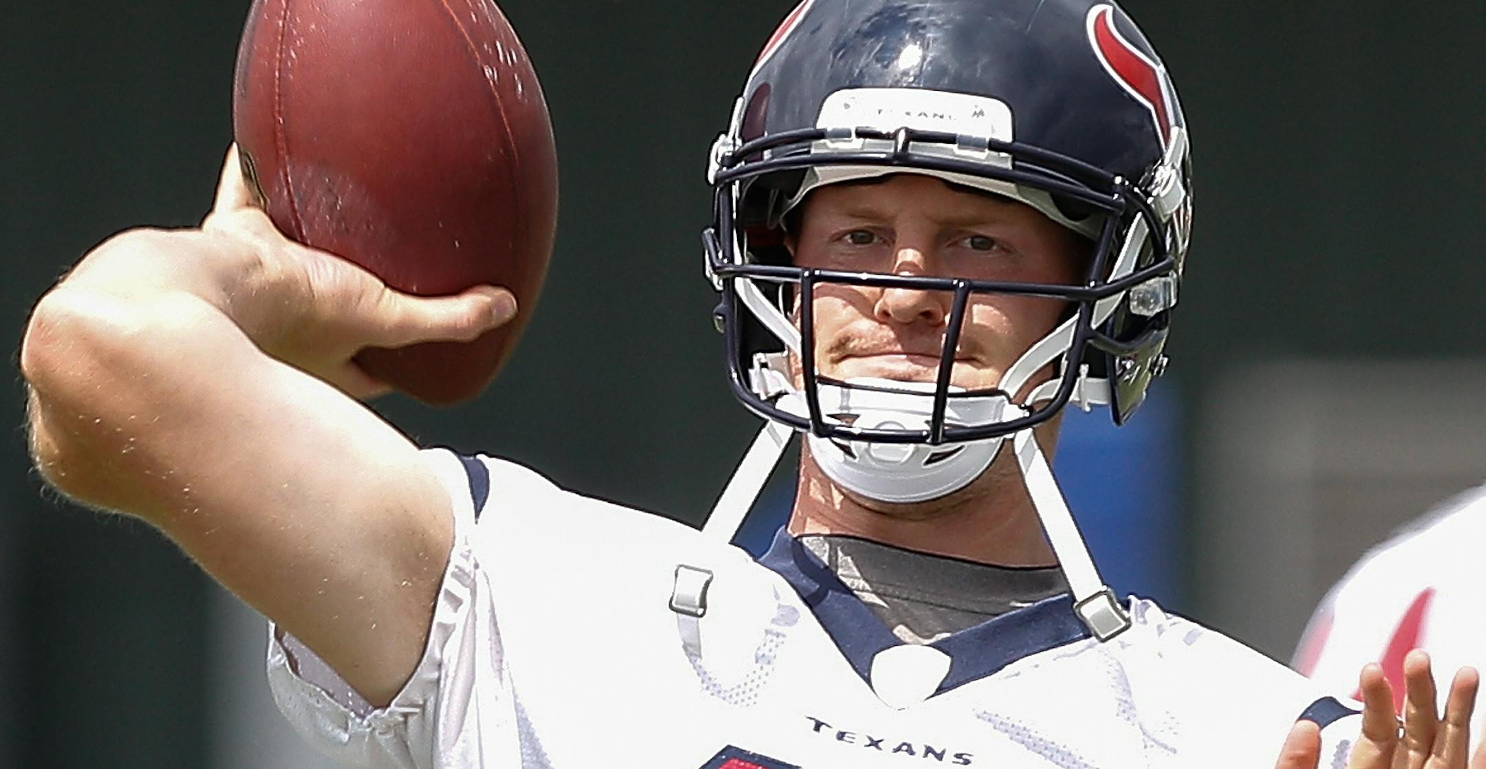 Houston Texans quarterback T.J. Yates throws a pass during Houston Texans practice Wednesday, June 12, 2013, in Houston. (AP Photo/Bob Levey) ORG XMIT: OTKBL124