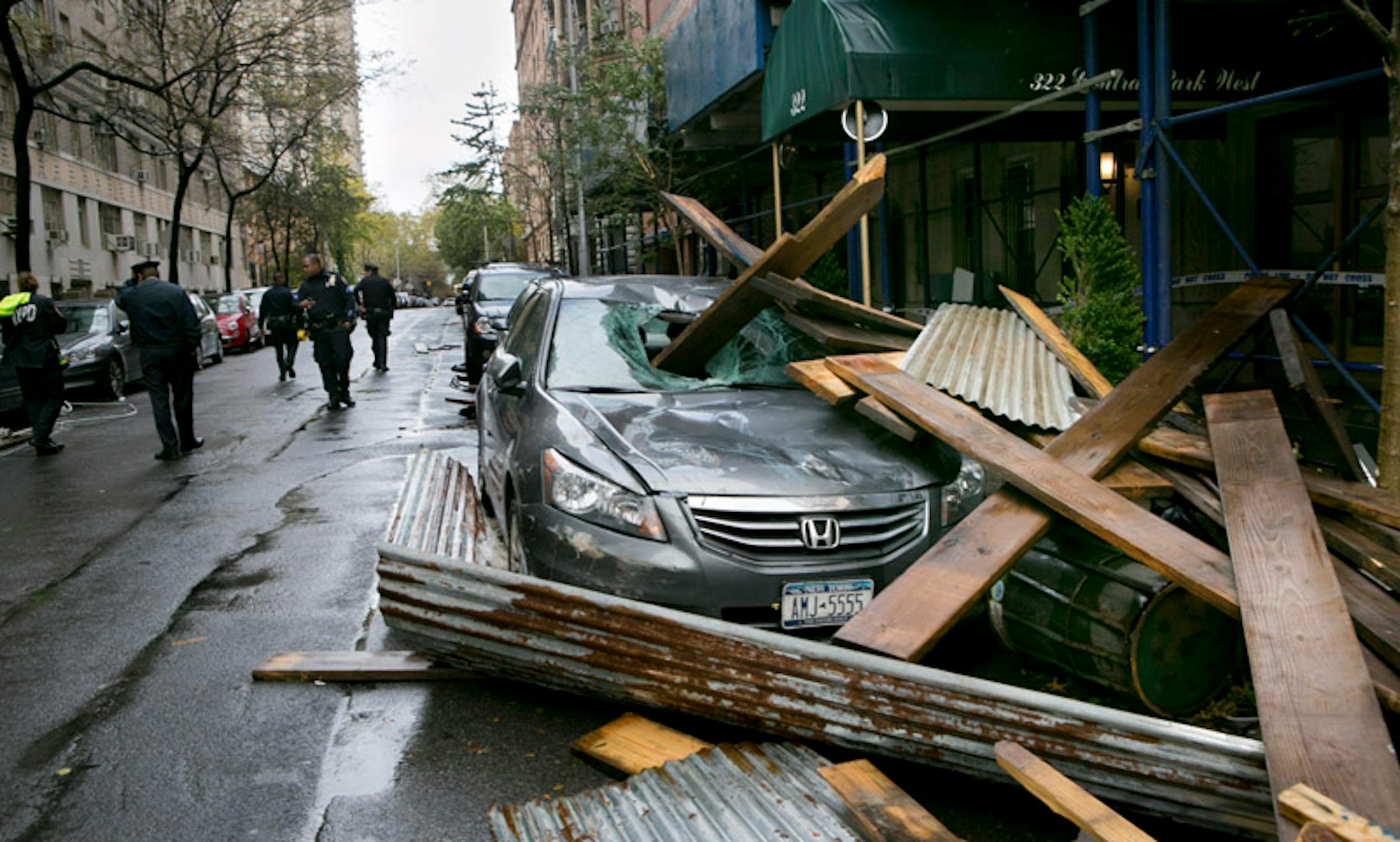Fallen wood from scaffolding on a parked car at 92nd Street in New York, Oct. 29, 2012. A