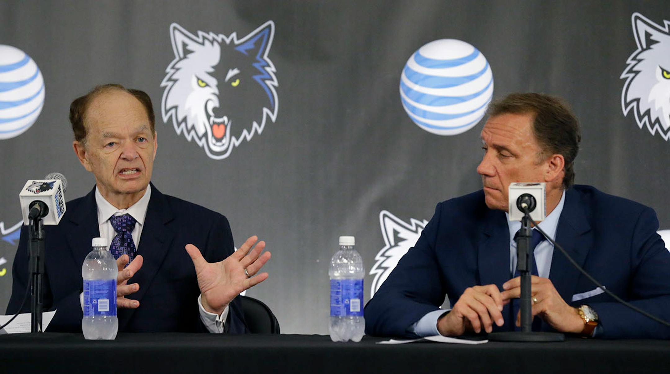 Minnesota Timberwolves team president of basketball operations and new head coach Flip Saunders, right, listens as team owner Glen Taylor, left, responds to a question during a media availability in Minneapolis, Friday, June 6, 2014. (AP Photo/Ann Heisenfelt)