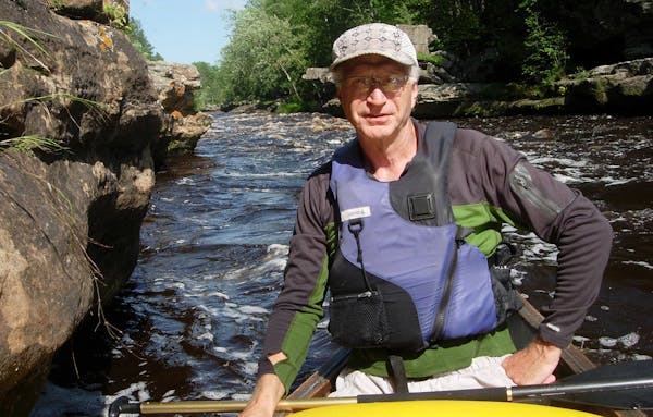 Greg Breining, shown on the Kettle River, for Outdoors Weekend